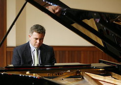 Dr. Robert Holm is pictured at the keyboard.